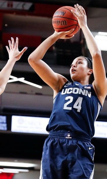 Collier reaches mark, No. 2 UConn women beat Cincy 65-55
